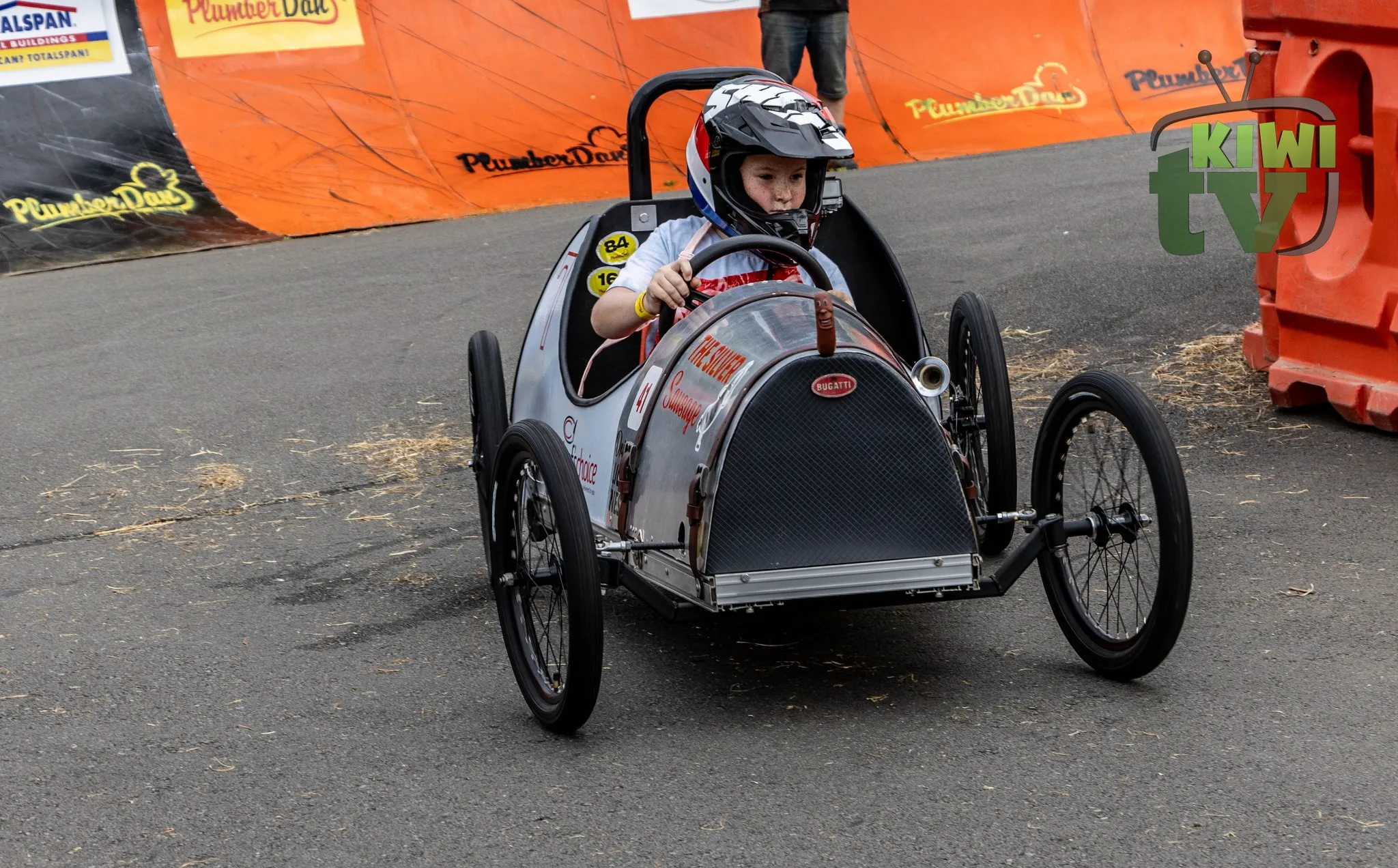 Marshal giving thumbs up to ready racers