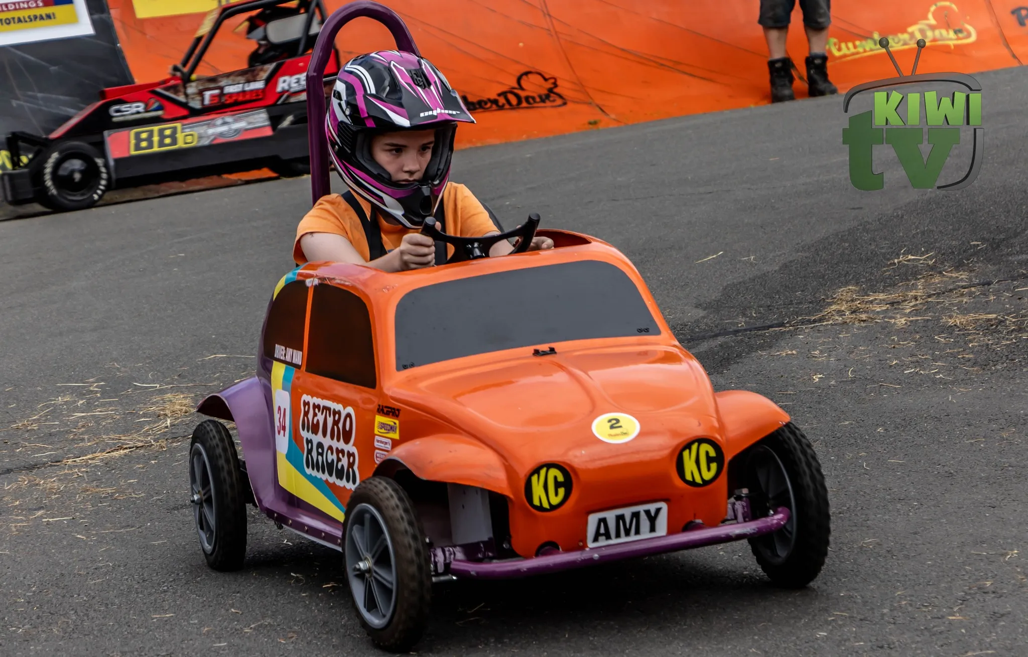 Soap box derby racing along chicane section in 2022