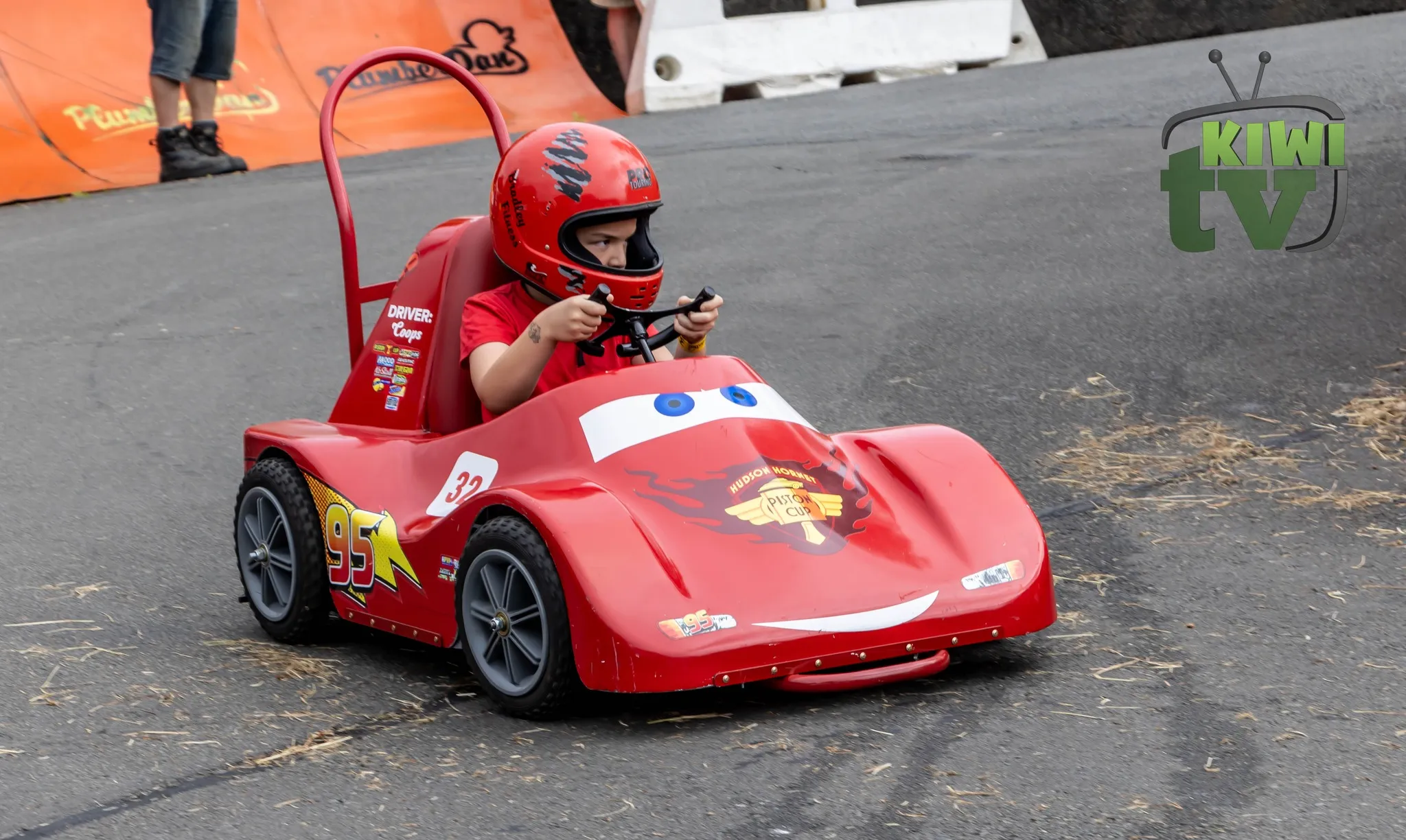 Crowds watching from Drews Ave terraces